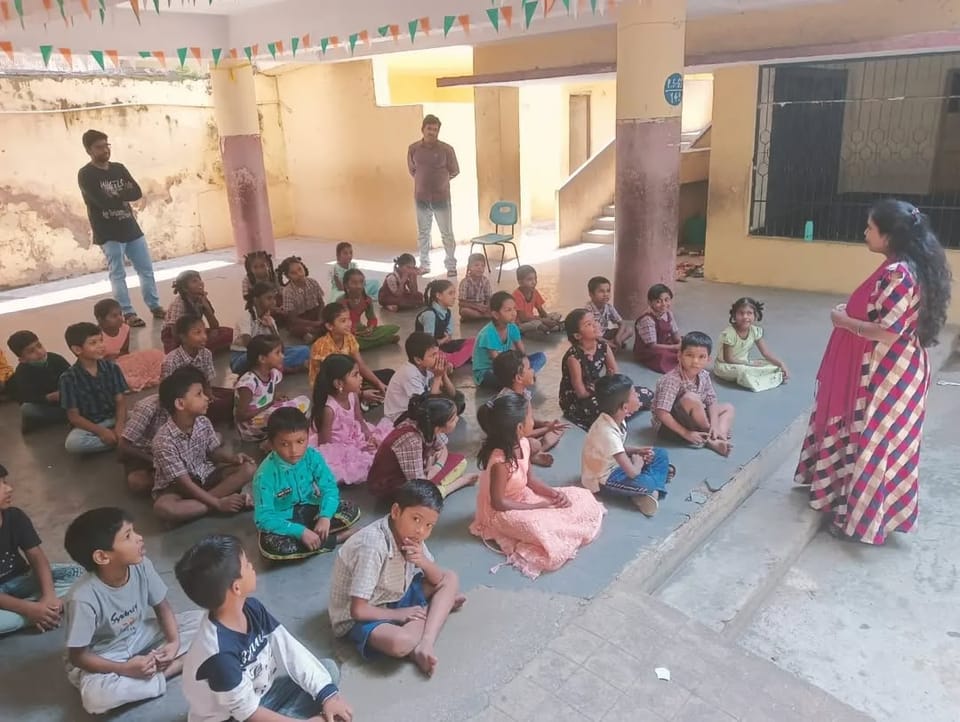 2 volunteers distributed educational kits to 50 school students in Hyderabad