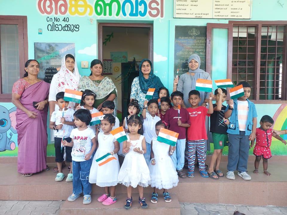 3 volunteers distributed handmade national flags to 25 children of Anganwadi in collaboration with Being Jigyaasu and Wipro to celebrate Republic Day in Ernakulam.